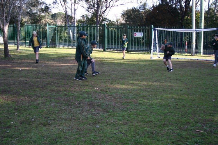 Graphic of children playing soccer